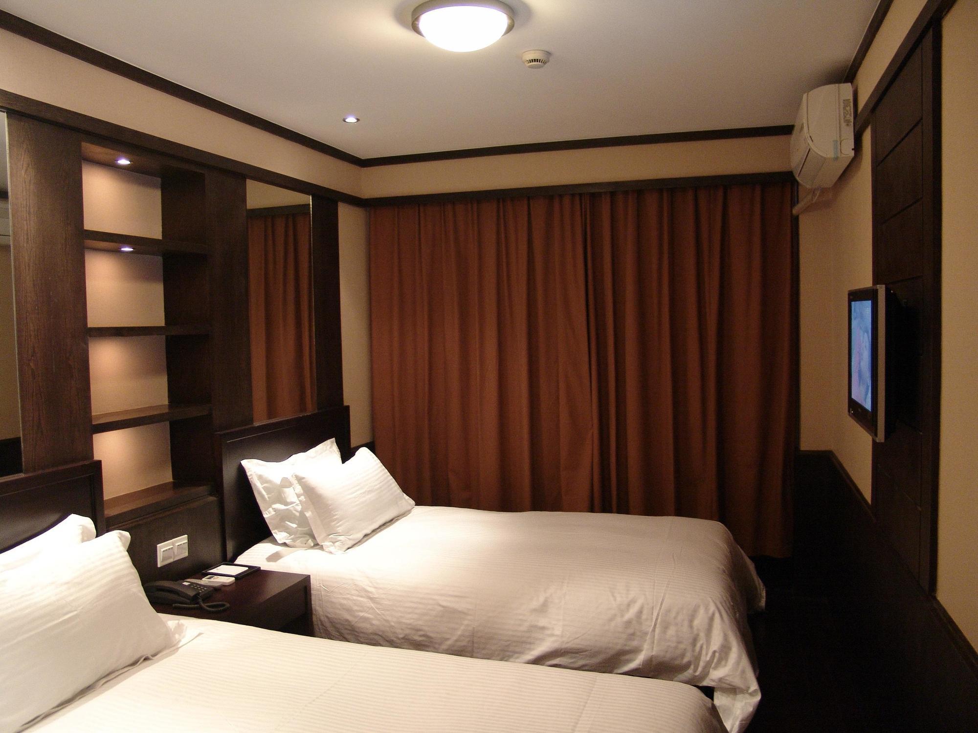 Baolong Homelike Hotel - Henglong Hotel Jingan Екстер'єр фото
